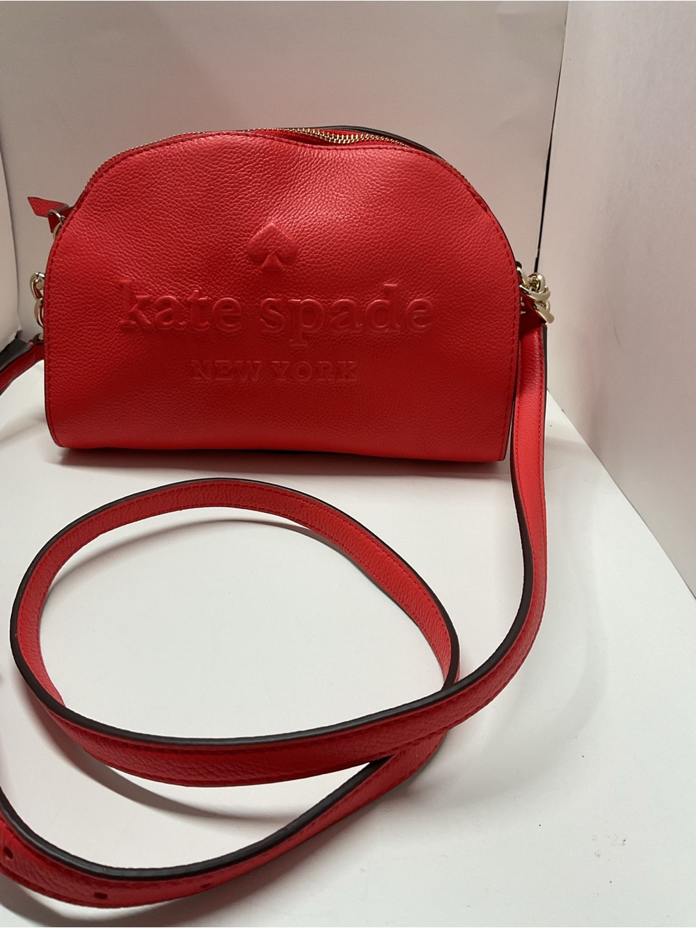 Kate Spade  Larchmont Avenue logo Tori orange Pebbled Leather Dome Crossbody Bag